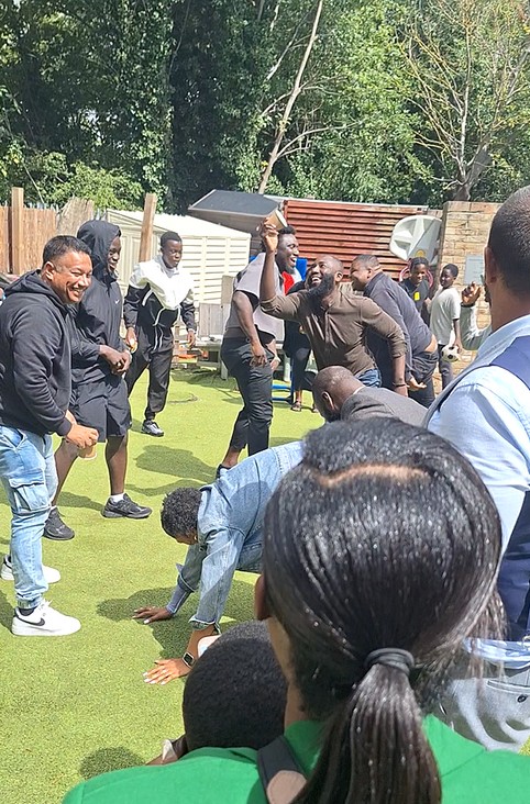 Church members enjoying games and fellowship outdoors